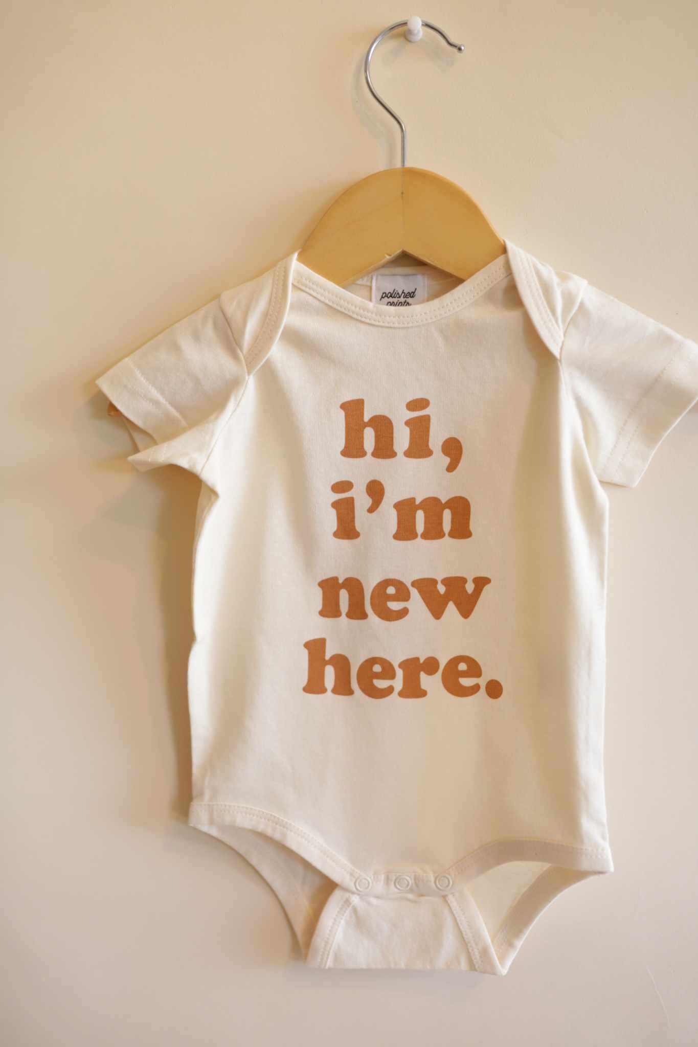 "Hi I'm New Here" Baby Onesie (Ginger)